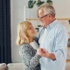 senior couple dancing in their home, TMS Therapy for Depression