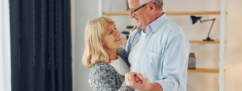 senior couple dancing in their home, TMS Therapy for Depression