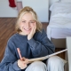 bipolar-disorder-treatment-rapid-city-sd_portrait-of-smiling-charismatic-young-woman-writing