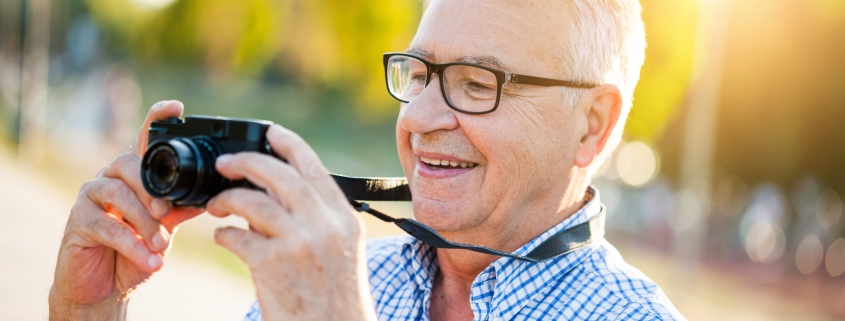 senior-man-smiling-outdoors_learning-photography-after-treating-adult-adhd